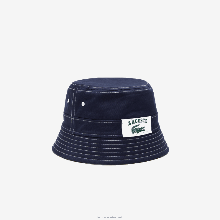 Lacoste Heritage omkeerbare print of vissershoed van effen katoen 0828H2342 marineblauw wit 525 Heren