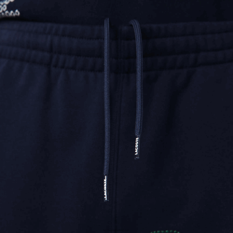 Lacoste Heritage gedestructureerde joggingbroek van katoenfleece met branding 0828H1206 marineblauw 166 Heren