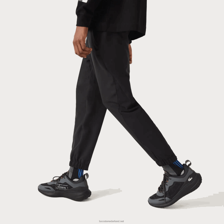 Lacoste sportbroek met ritssluiting onderaan 0828H1091 zwart c31 Heren