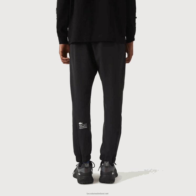 Lacoste sportbroek met ritssluiting onderaan 0828H1091 zwart c31 Heren