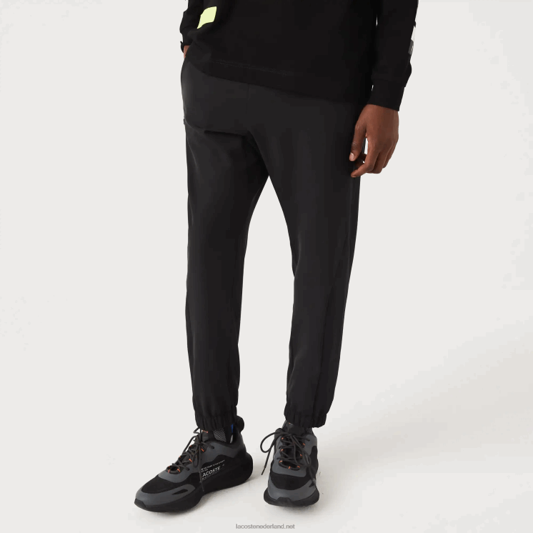 Lacoste sportbroek met ritssluiting onderaan 0828H1091 zwart c31 Heren