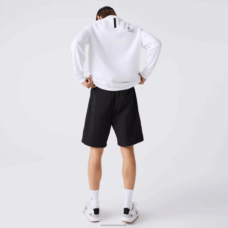 Lacoste Short met kleurvlakken en patchwork-effect 0828H1500 zwart blauw wit se1 Heren