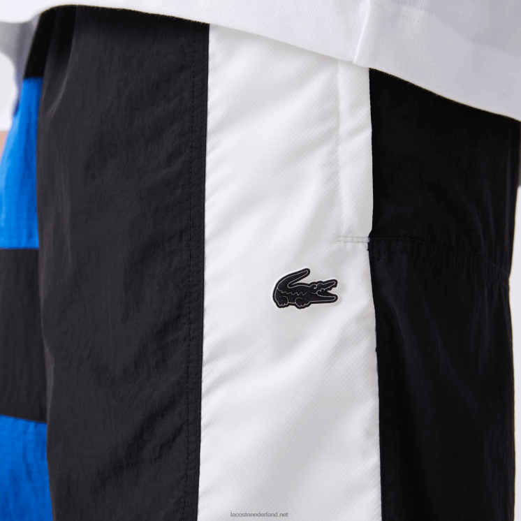 Lacoste Short met kleurvlakken en patchwork-effect 0828H1500 zwart blauw wit se1 Heren