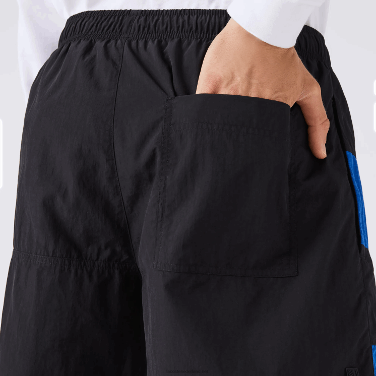Lacoste Short met kleurvlakken en patchwork-effect 0828H1500 zwart blauw wit se1 Heren