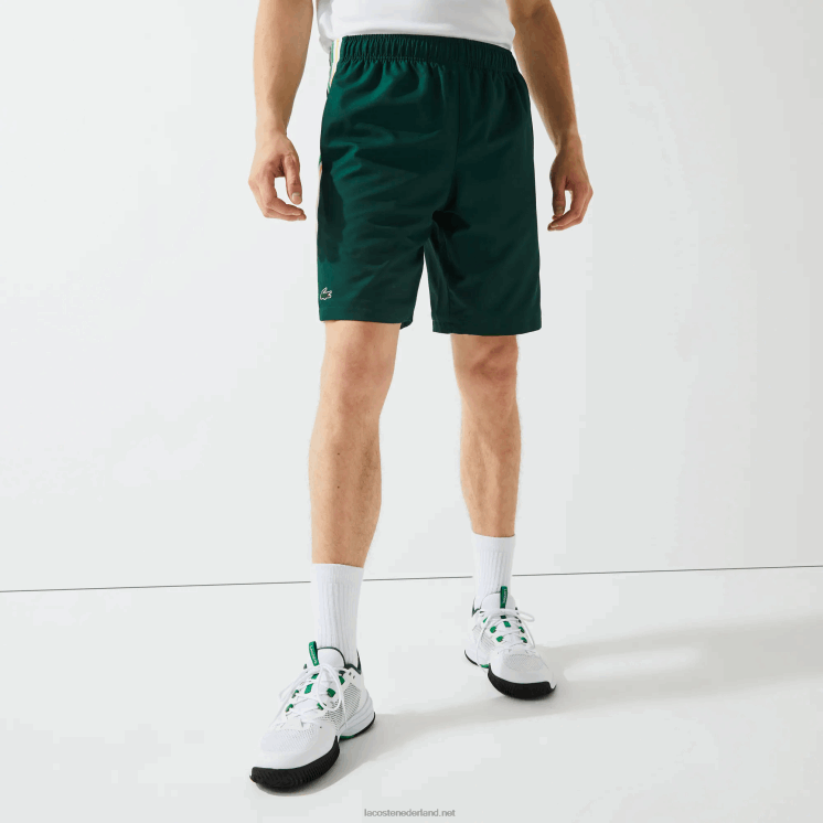 Lacoste lichtgewicht sportbroek met contrasterende banden 0828H1362 groen geel wit 117 Heren