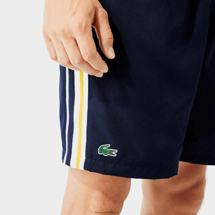 Lacoste lichtgewicht sportbroek met contrasterende banden 0828H1363 marineblauw geel wit apk Heren