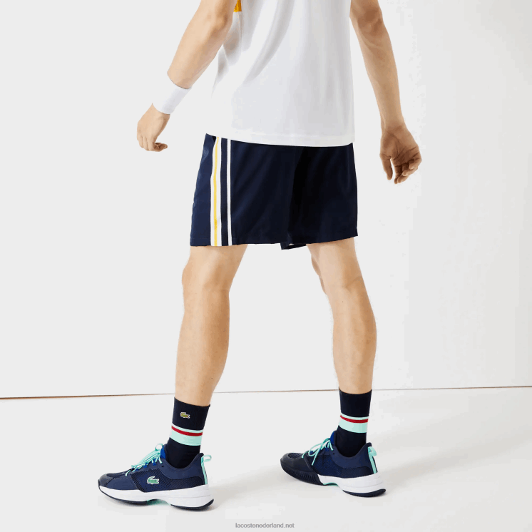 Lacoste lichtgewicht sportbroek met contrasterende banden 0828H1363 marineblauw geel wit apk Heren