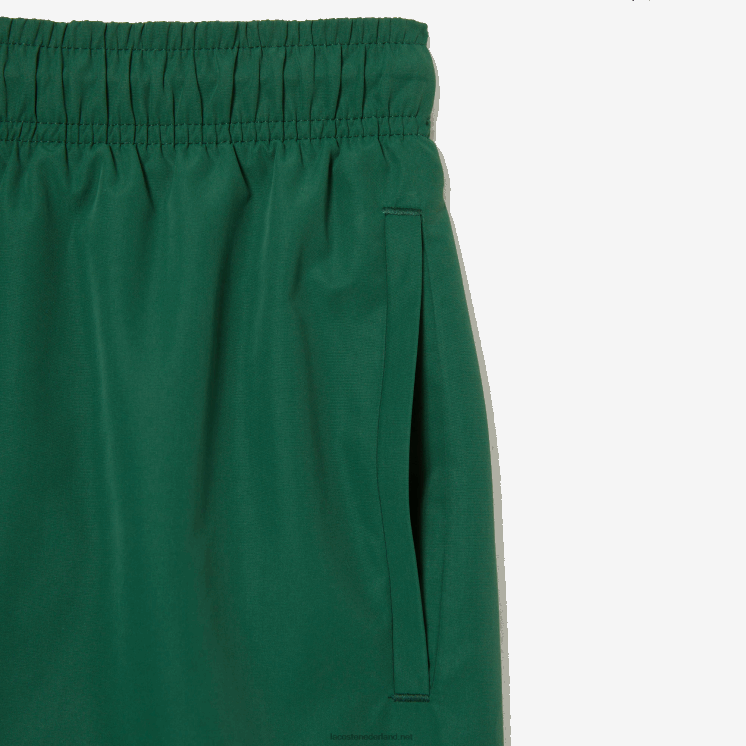 Lacoste sneldrogende zwembroek met reistas 0828H519 groen 132 Heren