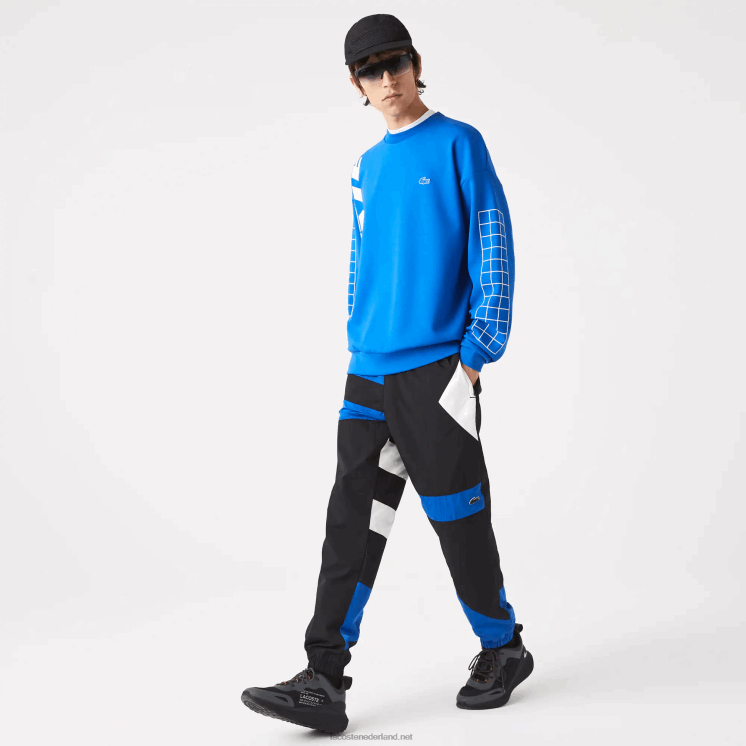 Lacoste patchwork waterafstotende trainingsbroek 0828H1105 zwart blauw wit se1 Heren