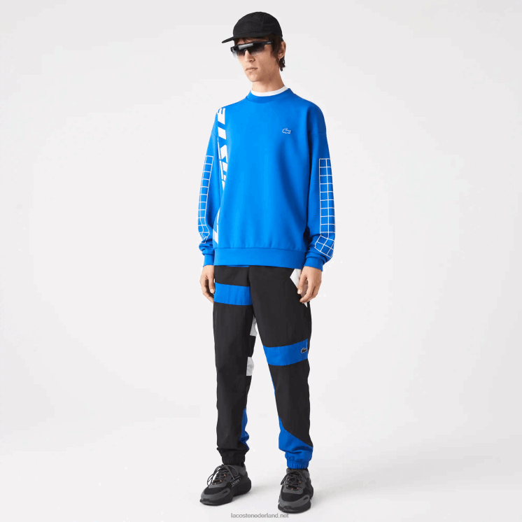 Lacoste patchwork waterafstotende trainingsbroek 0828H1105 zwart blauw wit se1 Heren