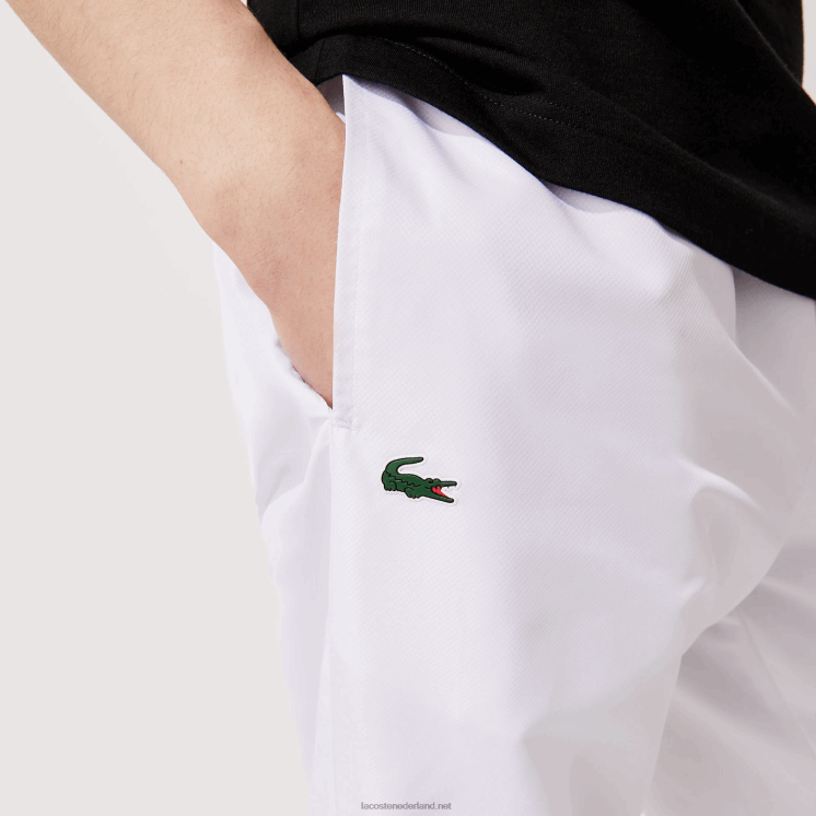 Lacoste sportieve trainingsbroek van lichte stof 0828H549 wit 001 Heren
