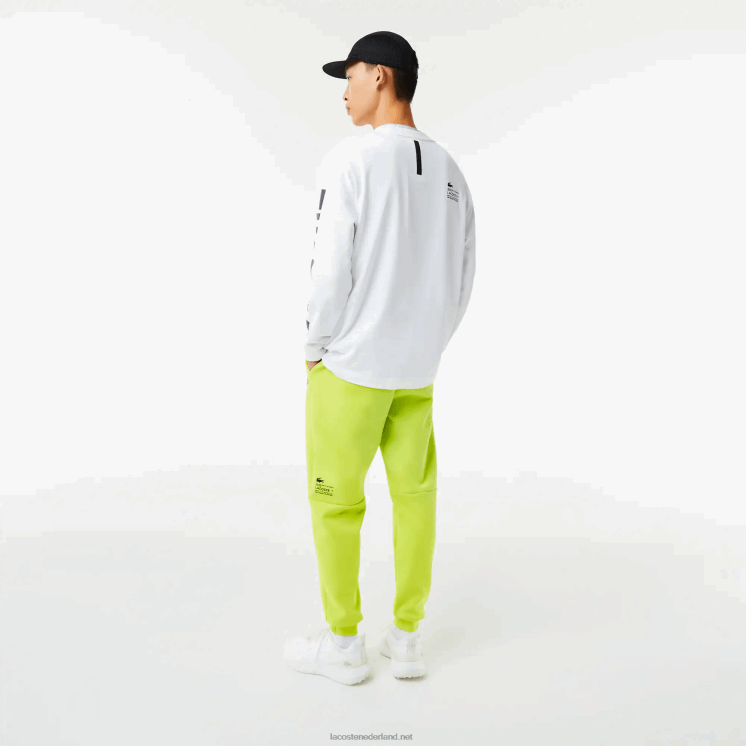 Lacoste trainingsbroek met reflecterende print 0828H1046 geel 90v Heren