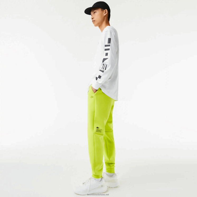 Lacoste trainingsbroek met reflecterende print 0828H1046 geel 90v Heren