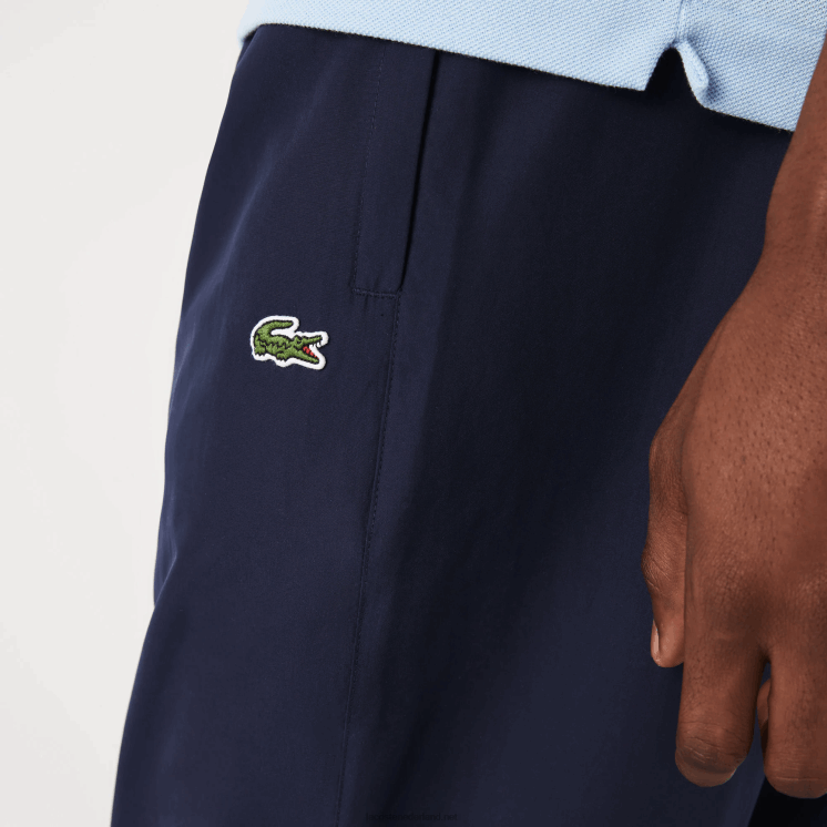 Lacoste waterafstotende trainingsbroek met normale pasvorm 0828H332 marineblauw 166 Heren