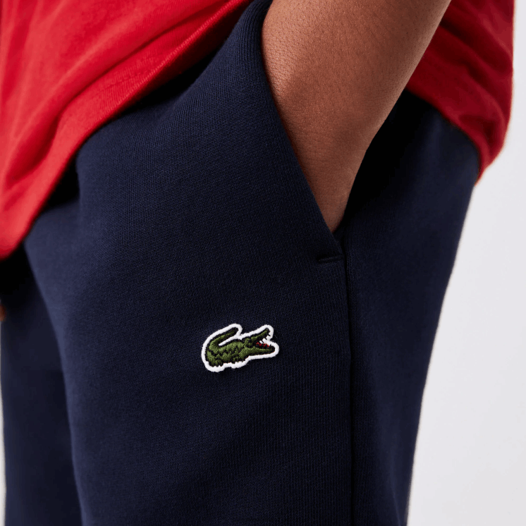 Lacoste merk trainingsbroek 0828H3215 marineblauw wit rood wet kinderen