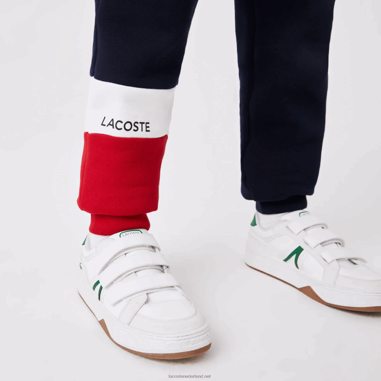 Lacoste merk trainingsbroek 0828H3215 marineblauw wit rood wet kinderen
