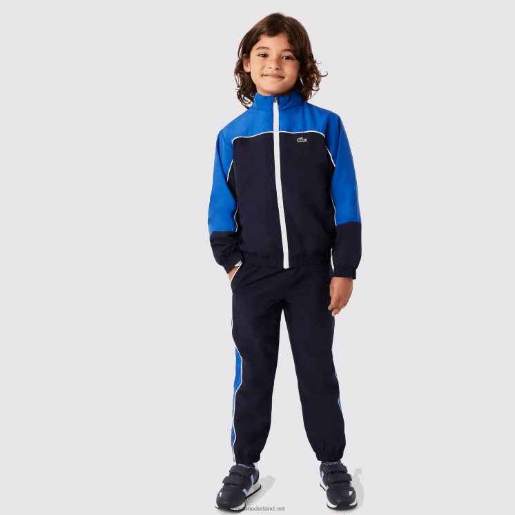 Lacoste sport trainingspak met kleurvlakken 0828H3209 marineblauw 976 jongens