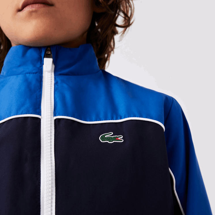 Lacoste sport trainingspak met kleurvlakken 0828H3209 marineblauw 976 jongens