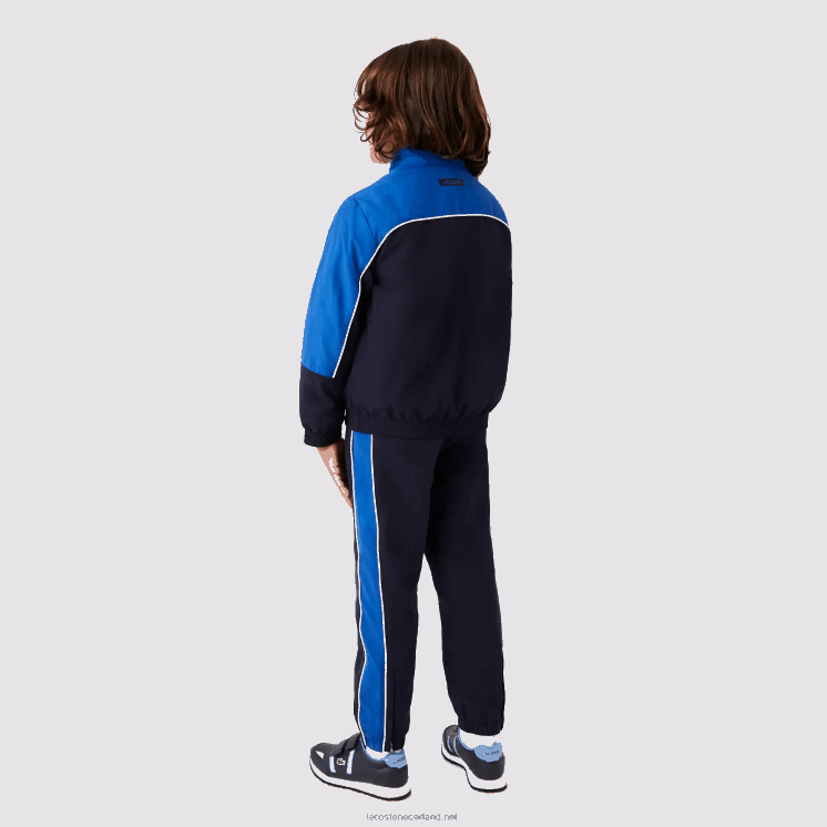 Lacoste sport trainingspak met kleurvlakken 0828H3209 marineblauw 976 jongens