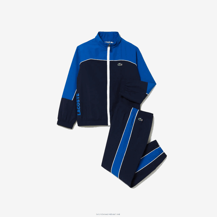 Lacoste sport trainingspak met kleurvlakken 0828H3209 marineblauw 976 jongens