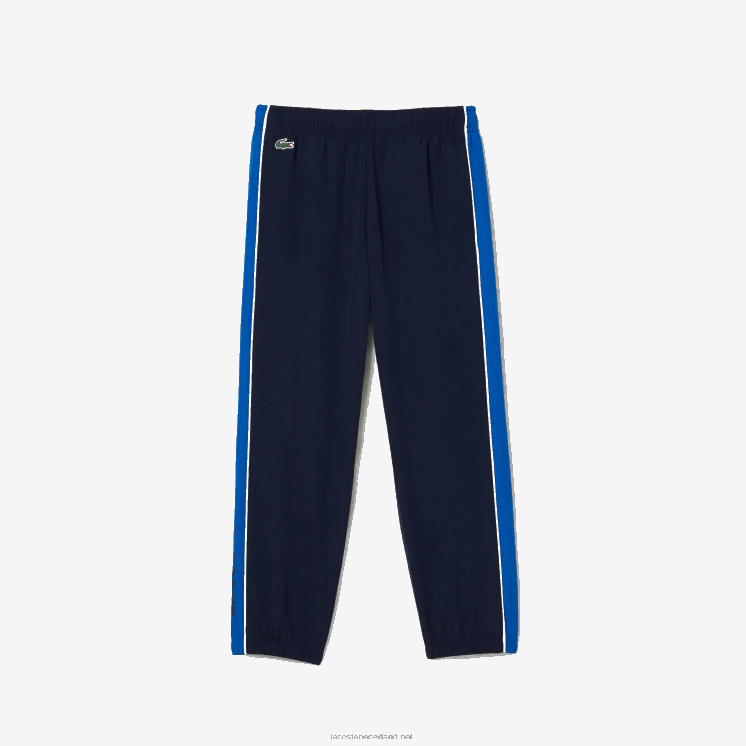 Lacoste sport trainingspak met kleurvlakken 0828H3209 marineblauw 976 jongens