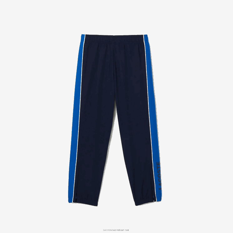 Lacoste sport trainingspak met kleurvlakken 0828H3209 marineblauw 976 jongens