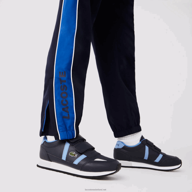 Lacoste sport trainingspak met kleurvlakken 0828H3209 marineblauw 976 jongens