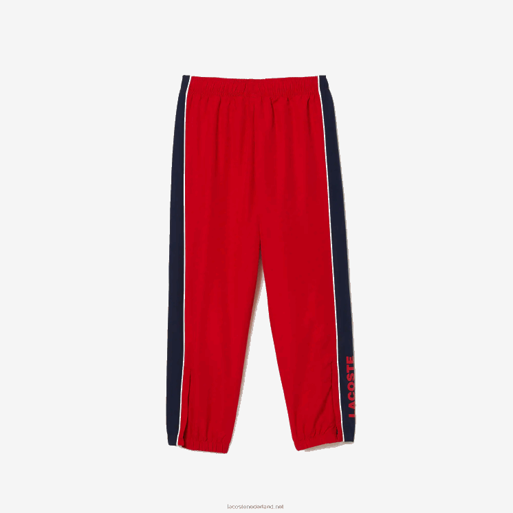 Lacoste sport trainingspak met kleurvlakken 0828H3210 rood marineblauw 528 jongens