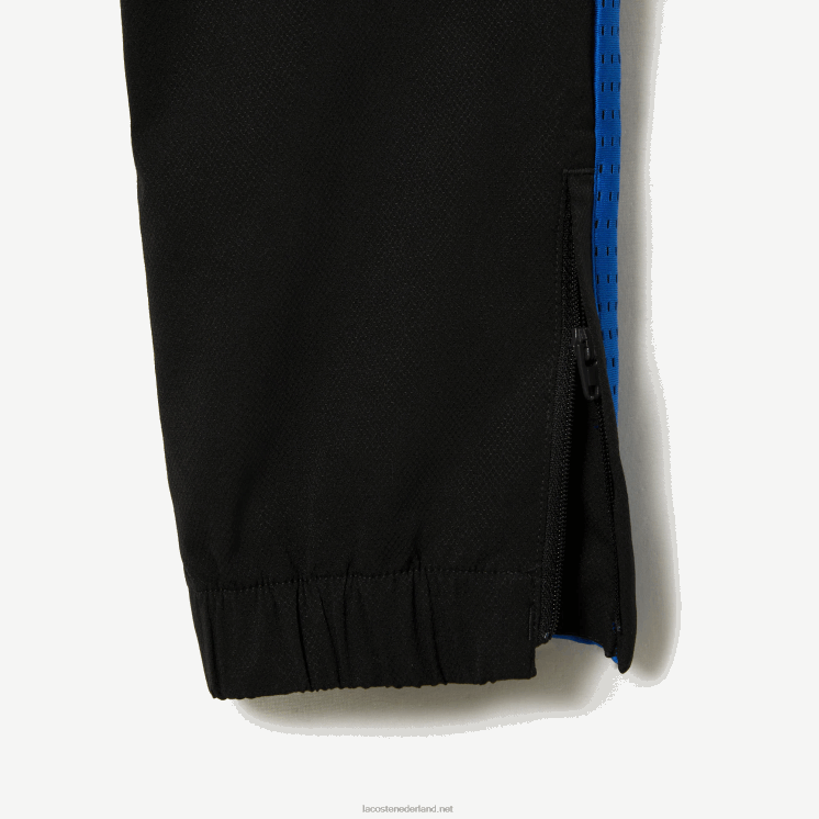 Lacoste tennis joggingbroek met kleurvlakken 0828H3047 zwart blauw geel av jongens