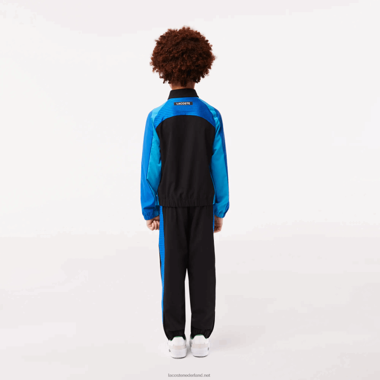Lacoste tennis joggingbroek met kleurvlakken 0828H3047 zwart blauw geel av jongens