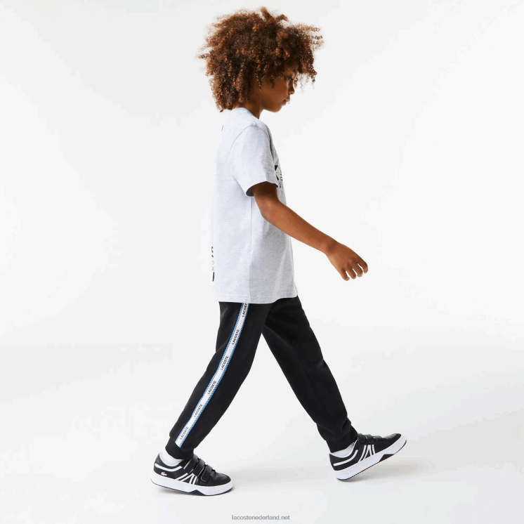 Lacoste trainingsbroek met bedrukte banden 0828H3223 zwart blauw 985 kinderen