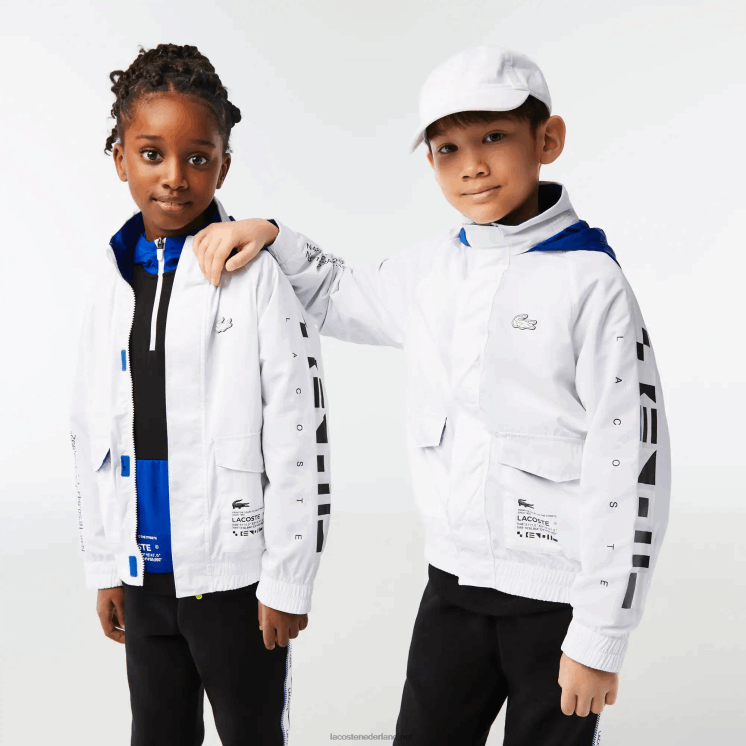 Lacoste waterafstotende jas met afneembare capuchon 0828H3240 wit blauw zwart 9cw kinderen