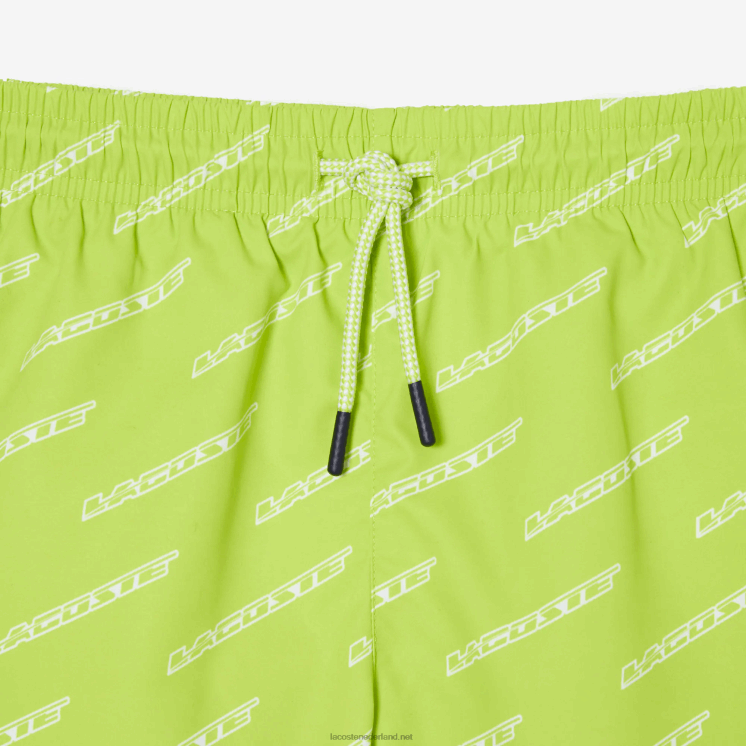 Lacoste zwembroek van gerecycled polyester met print 0828H3109 geel wit 9zv jongens