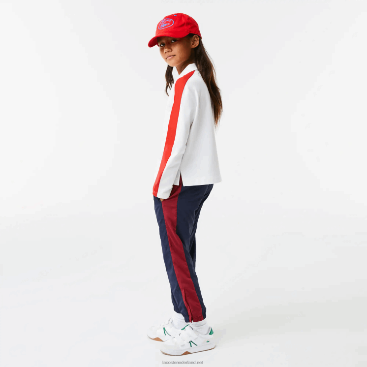 Lacoste polo met contrasterende band en ritssluiting 0828H3144 wit rood 7hu meisjes