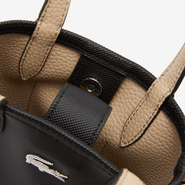 Lacoste anna signature petit pique omkeerbare schoudertas 0828H2871 zwarte krema a91 vrouwen