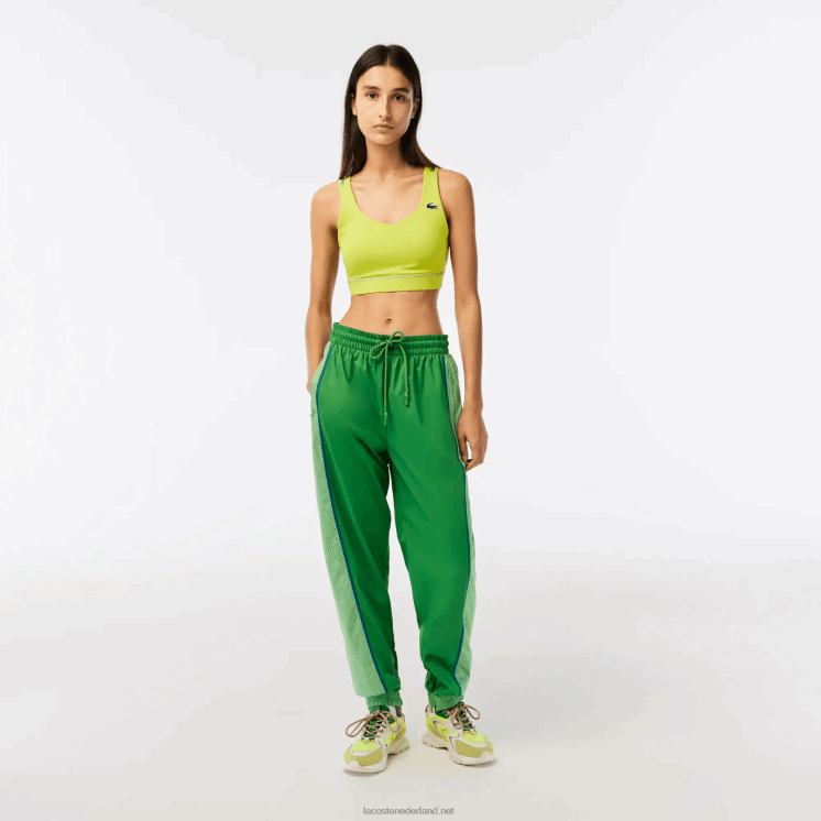 Lacoste trainingsbroek met geperforeerd effect 0828H2426 groen dbf vrouwen