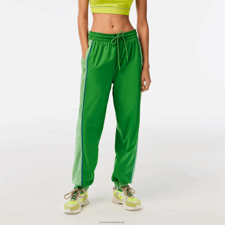 Lacoste trainingsbroek met geperforeerd effect 0828H2426 groen dbf vrouwen